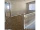 Upper hallway featuring carpet, and a staircase that enhances the home's inviting appeal at 2018 W Marconi Ave, Phoenix, AZ 85023