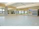 Spacious fitness studio featuring mirrored walls and a light hardwood floor at 20801 N 90Th Pl # 255, Scottsdale, AZ 85255