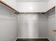 Walk-in closet featuring a clothing bar and upper shelving for optimal organization at 22322 W Loma Linda Cir, Buckeye, AZ 85326