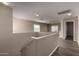 Upstairs landing with lots of natural light, offering views of the neighborhood at 22322 W Loma Linda Cir, Buckeye, AZ 85326
