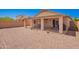 Covered backyard patio perfect for outdoor dining and entertaining at 22543 W Cocopah St, Buckeye, AZ 85326