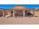 Covered backyard patio perfect for outdoor dining and entertaining at 22543 W Cocopah St, Buckeye, AZ 85326