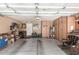 Spacious three car garage with built-in storage and workbench at 22543 W Cocopah St, Buckeye, AZ 85326