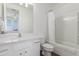 Clean bathroom featuring a white vanity, toilet, and shower/tub combination at 23042 E Excelsior Ave, Queen Creek, AZ 85142