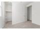 Neutral bedroom showcases multiple doorways and natural light, creating an open feel at 23042 E Excelsior Ave, Queen Creek, AZ 85142