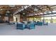 The clubhouse seating area creates a relaxing atmosphere for socializing and enjoying the outdoors at 23042 E Excelsior Ave, Queen Creek, AZ 85142