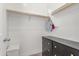 Bright walk-in closet with shelving and drawers for organized storage at 23042 E Excelsior Ave, Queen Creek, AZ 85142