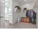 Spacious walk-in closet with ample shelving and hanging space provides plenty of storage at 23042 E Excelsior Ave, Queen Creek, AZ 85142