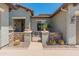 Inviting gated courtyard featuring desert landscaping and beautiful decor at 26484 W Mohawk Ln, Buckeye, AZ 85396