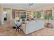 This stunning living room features a built-in entertainment center and a comfortable seating arrangement at 26484 W Mohawk Ln, Buckeye, AZ 85396