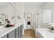 Bathroom features double sinks, soaking tub, and a separate glass-enclosed shower at 3026 W Silver Fox Way, Phoenix, AZ 85045
