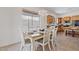 Eat-in kitchen includes a dining area and large windows for natural light at 3026 W Silver Fox Way, Phoenix, AZ 85045