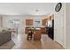 Spacious kitchen with island, stainless appliances, and adjacent dining area and living room at 3026 W Silver Fox Way, Phoenix, AZ 85045