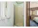 Bathroom featuring a shower with a frosted glass door, providing privacy and natural light at 3239 E Kings Ave, Phoenix, AZ 85032
