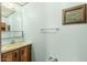 Modest bathroom featuring a vanity with a beige sink and matching wall decor at 3239 E Kings Ave, Phoenix, AZ 85032