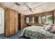 Comfortable bedroom featuring a built-in desk, a wardrobe, and natural light from large windows at 3239 E Kings Ave, Phoenix, AZ 85032