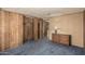 Simple bedroom design showing a closet and dresser on top of blue carpet at 3239 E Kings Ave, Phoenix, AZ 85032