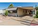 Charming single-story home featuring desert landscaping and covered parking at 3239 E Kings Ave, Phoenix, AZ 85032