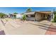 Charming single-story home featuring desert landscaping and covered parking at 3239 E Kings Ave, Phoenix, AZ 85032