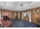 Cozy living room featuring comfortable seating and a bright window with sheer curtains at 3239 E Kings Ave, Phoenix, AZ 85032