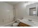Bright bathroom featuring a shower-tub combo, white tiles and single sink vanity at 3282 S Warner Dr, Apache Junction, AZ 85120