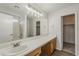 Large, bright bathroom with dual access to a shower-tub, sink, and commode at 3282 S Warner Dr, Apache Junction, AZ 85120