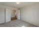 Cozy bedroom with plush carpet and a neutral color scheme at 3282 S Warner Dr, Apache Junction, AZ 85120