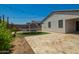 Backyard featuring a trampoline and well-manicured lawn, ideal for Gathering activities at 3715 S 57Th Ln, Phoenix, AZ 85043