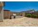 Backyard featuring a built-in barbecue, perfect for outdoor cooking and entertaining at 3715 S 57Th Ln, Phoenix, AZ 85043