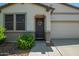 Charming single-story home featuring a two-car garage, neutral stucco, desert landscaping, and a welcoming front door at 3715 S 57Th Ln, Phoenix, AZ 85043