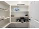 Pantry with shelving for food storage and household items at 3715 S 57Th Ln, Phoenix, AZ 85043