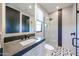 Modern bathroom with sleek vanity, glass shower, and contemporary tile work at 37200 N Cave Creek Rd # 1045, Scottsdale, AZ 85262