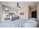Spacious bedroom with a tray ceiling, plush rug, and ample natural light at 37200 N Cave Creek Rd # 1045, Scottsdale, AZ 85262