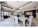 Open floor plan with dining room adjacent to modern kitchen and living spaces at 37200 N Cave Creek Rd # 1045, Scottsdale, AZ 85262