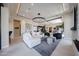 Bright, open living room features modern lighting, neutral tones, and comfortable seating at 37200 N Cave Creek Rd # 1045, Scottsdale, AZ 85262