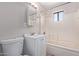 Full bathroom featuring a toilet, vanity and shower/tub combination at 3722 W Hadley St, Phoenix, AZ 85009