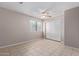 This bright bedroom has a window view and closet space at 3722 W Hadley St, Phoenix, AZ 85009