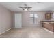 An eat-in living space with tile flooring, a ceiling fan, and a window at 3722 W Hadley St, Phoenix, AZ 85009