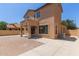 Spacious backyard featuring a patio with both brick and concrete, perfect for outdoor entertaining at 4051 E Torrey Pines E Ln, Chandler, AZ 85249