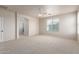 Large bedroom with carpet, ceiling fan and large window for natural light at 4051 E Torrey Pines E Ln, Chandler, AZ 85249