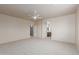 Large bedroom with carpet, ceiling fan and arched doorway at 4051 E Torrey Pines E Ln, Chandler, AZ 85249