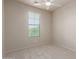 Carpeted bedroom featuring a view via a window with blinds for comfortable and private living at 4051 E Torrey Pines E Ln, Chandler, AZ 85249
