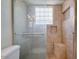 Modern bathroom showcases a tiled glass-enclosed shower with a built-in seat at 4330 E Desert Trumpet Rd, Phoenix, AZ 85044