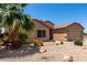 Nice single-story home with easy-care desert landscape design and a convenient two-car garage at 43581 W Mccord Dr, Maricopa, AZ 85138