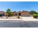 Charming single-story home featuring low-maintenance desert landscaping and a two-car garage at 43581 W Mccord Dr, Maricopa, AZ 85138
