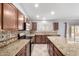 Kitchen with granite countertops, stainless steel appliances, and ample cabinetry at 43581 W Mccord Dr, Maricopa, AZ 85138