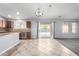 Open kitchen and living area with stainless steel appliances and access to the pool at 43581 W Mccord Dr, Maricopa, AZ 85138