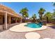 Private backyard featuring a sparkling pool and covered patio, perfect for relaxation and entertaining at 43581 W Mccord Dr, Maricopa, AZ 85138
