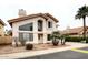 Charming two-story home featuring stucco siding, tile roof, desert landscaping, and a welcoming entrance at 4437 E Villa Theresa Dr, Phoenix, AZ 85032