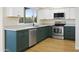 A beautifully designed kitchen featuring stainless steel appliances and modern cabinetry at 4611 E Fremont St, Phoenix, AZ 85042